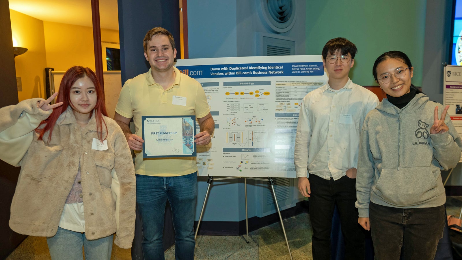 Photo caption: The Bill.com student team Jiaxin Li  (left), Davyd Fridman, ZiZhong Yan, and Ziwei “Jenny” Li, plus Keyan Zhang and Xinyue “Kaylee” Pang (not pictured) helped their sponsor identify duplicate vendor records based on transaction invoices and other accounting data.